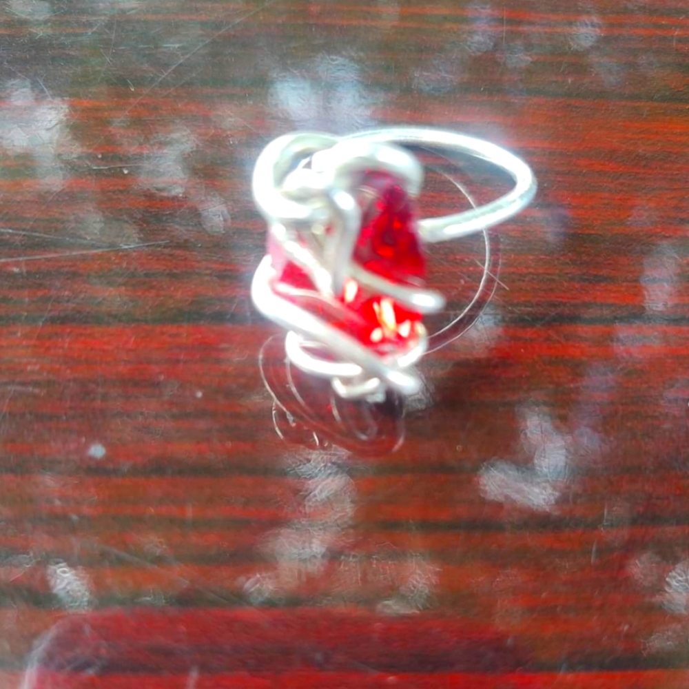 I fashioned this ring out of real silver time and patience... Size 8 1/2 to 9...